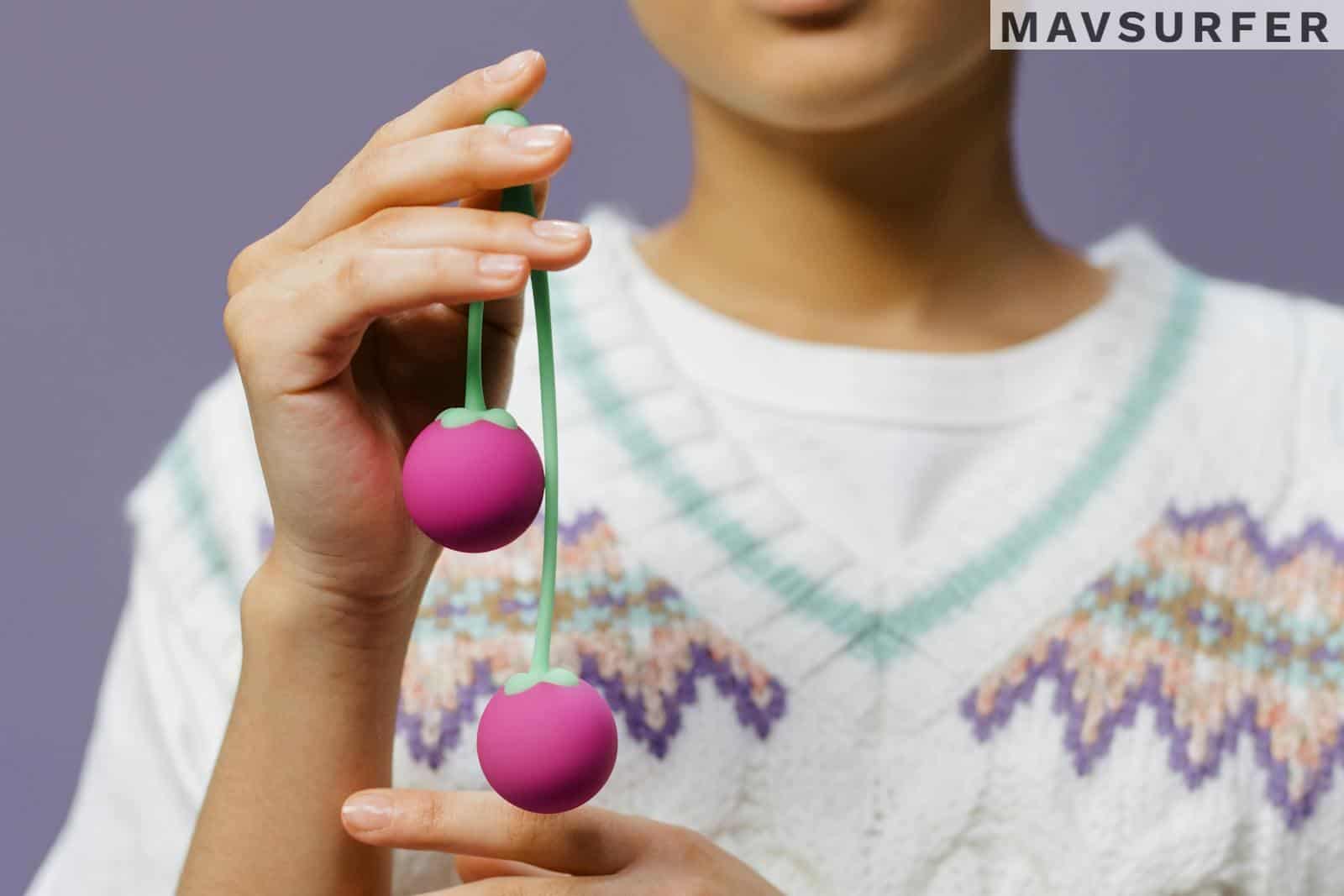 Close-Up Shot of a Person Holding Adult Toys
